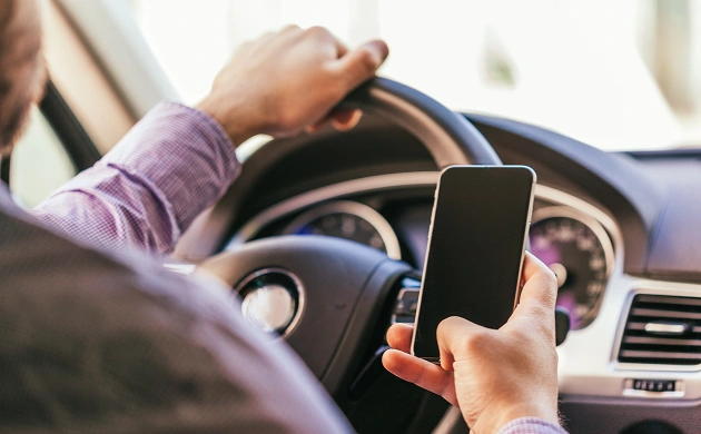 Danger on The Road: How Distracted Driving Shifts Collision Liability